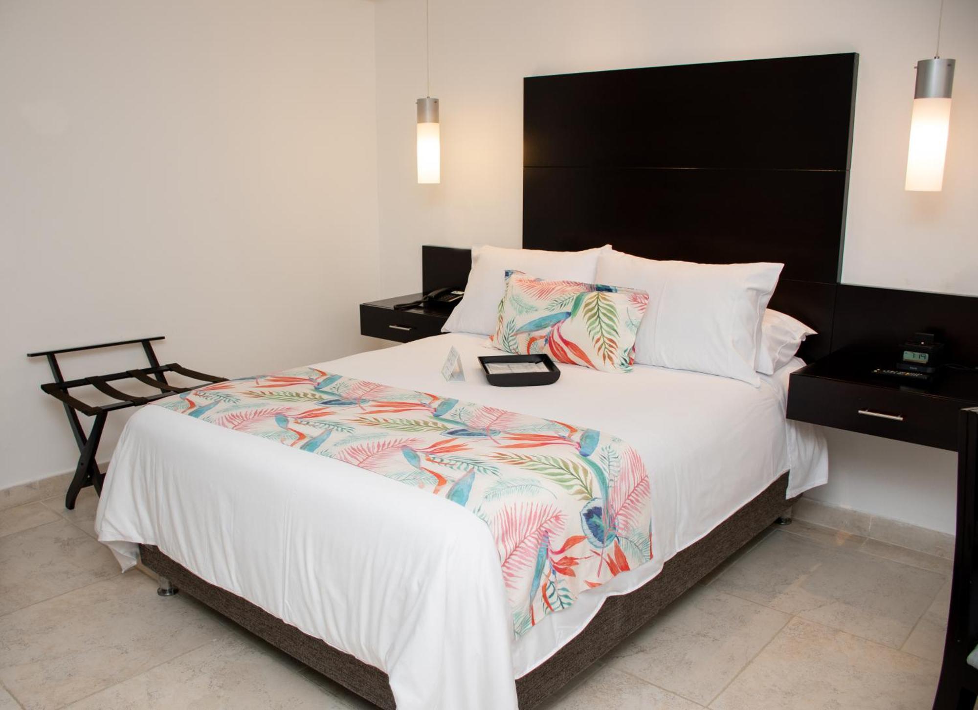 Hotel Capilla Del Mar Cartagena Bagian luar foto A bedroom at the hotel